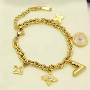 Lovely gold tone charm bracelet